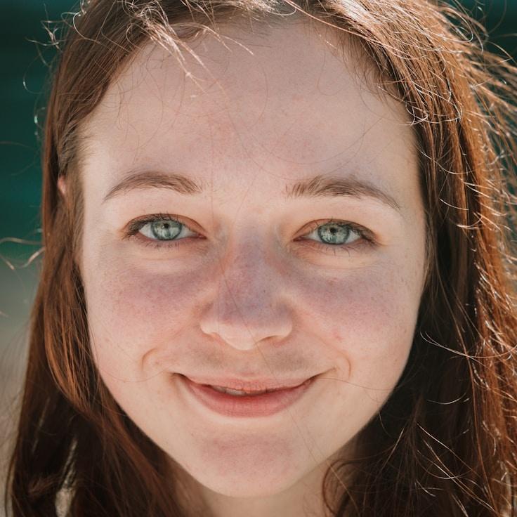 Alex Carter, Lead Design Curator at Creative Vision Board, reviewing corporate floral arrangements